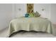 Comfortable bedroom with neutral carpet, floral tapestry, and coordinated pillows for a relaxing atmosphere at 235 6Th Nw St # 307, Winter Haven, FL 33881