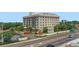 Wide exterior view showing The Haven's building with balcony views and surrounding greenery from the street at 235 6Th Nw St # 307, Winter Haven, FL 33881