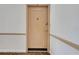 A view of the apartment 30 front door with its stylish lock at 235 6Th Nw St # 307, Winter Haven, FL 33881
