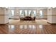 Spacious lobby with multiple windows, seating, and tile flooring at 235 6Th Nw St # 307, Winter Haven, FL 33881