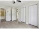 Bedroom featuring access to both a bathroom and outdoor balcony area at 2369 Tom Jones St # 8, Orlando, FL 32839
