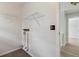 Practical laundry area featuring wire racks and plumbing fixtures for laundry appliances at 2369 Tom Jones St # 8, Orlando, FL 32839