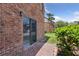 Sliding glass doors opening onto a brick patio and lush greenery, connecting indoor/outdoor living at 2369 Tom Jones St # 8, Orlando, FL 32839