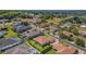 An aerial view of the property showcases its proximity to a quiet residential street with mature trees at 2743 Verandah Vue Way, Lakeland, FL 33812