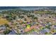 Enjoy the serene neighborhood and nearby lake from this beautiful property's aerial view at 2743 Verandah Vue Way, Lakeland, FL 33812