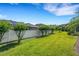 Large backyard with a white fence offering lots of space at 2743 Verandah Vue Way, Lakeland, FL 33812