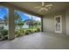 The screened patio provides an ideal space to enjoy the Florida weather and green backyard at 2743 Verandah Vue Way, Lakeland, FL 33812