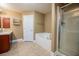 Spacious bathroom with double shower, soaking tub, and tile floors at 2933 Blackwater Oaks Dr, Mulberry, FL 33860