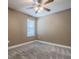 Bedroom featuring neutral walls, plush carpeting and a ceiling fan at 2933 Blackwater Oaks Dr, Mulberry, FL 33860