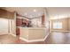 Open concept kitchen featuring stainless steel appliances, granite countertops, and laminate flooring at 2933 Blackwater Oaks Dr, Mulberry, FL 33860
