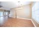 Bright open living area with laminate flooring, neutral colors, and plenty of natural light at 2933 Blackwater Oaks Dr, Mulberry, FL 33860