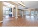 Open floor plan features laminate flooring, neutral color palette, and many windows for natural light at 2933 Blackwater Oaks Dr, Mulberry, FL 33860