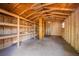 View of shed interior shows wood beams and shelves great for storage at 2933 Blackwater Oaks Dr, Mulberry, FL 33860