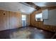 Inside the shed, you'll find dark stained wood floors, wood paneled walls, and a window at 2933 Blackwater Oaks Dr, Mulberry, FL 33860