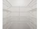 Close-up of pantry shelving offering ample storage for kitchen essentials at 3002 Helms Dr, Auburndale, FL 33823