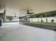 This is an enclosed patio with concrete flooring and ceiling fans at 3002 Helms Dr, Auburndale, FL 33823