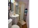 Cozy bathroom featuring a corner shower and traditional fixtures at 3233 Gardner Rd, Lakeland, FL 33810