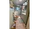 Cozy bathroom featuring a tiled shower, neutral walls and flooring with a modern vanity at 3233 Gardner Rd, Lakeland, FL 33810