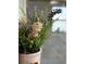 A close up of a vase with a variety of faux flowers at 3233 Gardner Rd, Lakeland, FL 33810