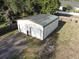 A two-car detached garage is showcased in an aerial view at 3233 Gardner Rd, Lakeland, FL 33810