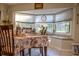 Bright dining area with a window seat and natural light from a large bay window at 3233 Gardner Rd, Lakeland, FL 33810