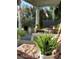 Relaxing outdoor porch with decorative artificial green plant in a modern white pot at 3233 Gardner Rd, Lakeland, FL 33810