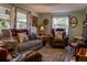 Cozy living room featuring comfortable seating, natural light, and stylish décor at 3233 Gardner Rd, Lakeland, FL 33810