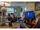The living room has comfortable seating, a TV, and decor at 3233 Gardner Rd, Lakeland, FL 33810
