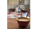This is a decorative table with a three wick candle at 3233 Gardner Rd, Lakeland, FL 33810