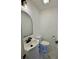 Neat powder room featuring a vanity, toilet, mirror, and modern fixtures at 375 Westover Pkwy, Bartow, FL 33830
