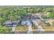 Suburban neighborhood featuring a cozy home with mature trees at 3822 Marquise Ln, Mulberry, FL 33860