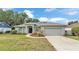 Charming single-story home with a well-manicured lawn and inviting curb appeal at 3822 Marquise Ln, Mulberry, FL 33860