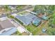 A fenced-in pool enhances this home with mature landscaping and a tranquil setting at 3822 Marquise Ln, Mulberry, FL 33860