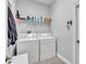Well-equipped laundry room with modern appliances and ample storage space at 3822 Marquise Ln, Mulberry, FL 33860