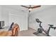This bedroom features a closet and a Peloton at 3946 Willow Ridge Dr, Lakeland, FL 33810