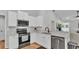 Bright, modern kitchen with stainless steel appliances and white cabinetry at 3946 Willow Ridge Dr, Lakeland, FL 33810