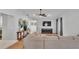 Bright and open living room featuring hardwood floors, a modern ceiling fan, and stylish decor at 3946 Willow Ridge Dr, Lakeland, FL 33810