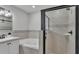 The main bathroom features double sinks, a soaking tub, and a glass-enclosed shower at 3946 Willow Ridge Dr, Lakeland, FL 33810