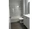 Modern bathroom featuring new vanity, tub, and shower at 4038 Oak Loop # 103, Mulberry, FL 33860