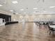 Bright ballroom with stage and ample seating, perfect for events and social gatherings at 4193 Stone Creek Loop, Lake Wales, FL 33859