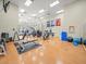 Well-equipped community gym featuring machines, weights, and motivational posters on the walls at 4193 Stone Creek Loop, Lake Wales, FL 33859