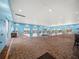 Bright indoor pool area with brick floors, ample natural light, and a refreshing atmosphere at 4193 Stone Creek Loop, Lake Wales, FL 33859