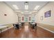 Serene community meeting room featuring comfortable seating, laminate floors, and bright windows at 4193 Stone Creek Loop, Lake Wales, FL 33859