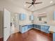 Bright room with custom cabinets, granite counters and hardwood floors at 4193 Stone Creek Loop, Lake Wales, FL 33859