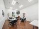 Bright recreation room with laminate floors, ample table space, and clean modern design at 4193 Stone Creek Loop, Lake Wales, FL 33859