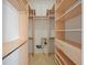 Spacious walk-in closet with custom shelving and ample storage space for an organized wardrobe at 4193 Stone Creek Loop, Lake Wales, FL 33859