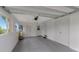 A clean and spacious garage with multiple doors and windows, offering plenty of room for parking and storage at 427 Longfellow Blvd, Lakeland, FL 33801