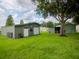 Exterior view featuring large outbuildings perfect for storage or workshop space at 427 Longfellow Blvd, Lakeland, FL 33801