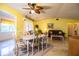 Inviting dining room with a six-chair dining table, tiled floor and decor at 4976 Pleasant Hollow Trl, Lakeland, FL 33811