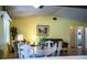 Inviting dining room with a six-chair dining table and decor at 4976 Pleasant Hollow Trl, Lakeland, FL 33811